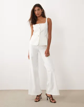 Good American denim good waist palazzo flare jeans in white - part of a set