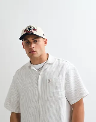 ASOS DESIGN oversized camp collar shirt with back print in white pinstripes