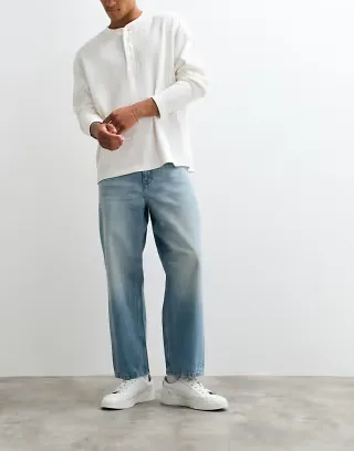 ASOS DESIGN relaxed tapered jeans in vintage light wash blue