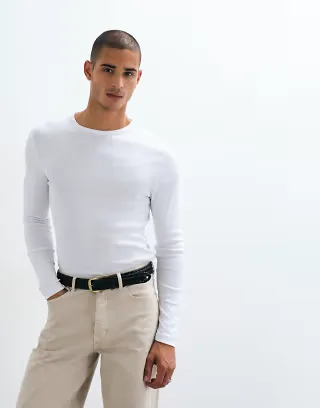 ASOS DESIGN muscle fit long sleeve ribbed T-shirt with embroidered chest emblem in white