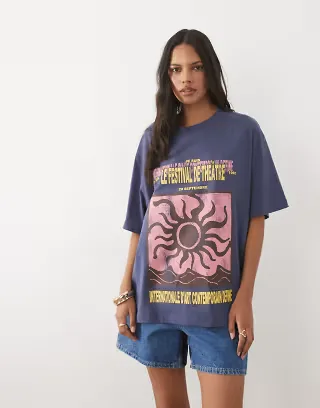 ASOS DESIGN oversized T-shirt with Le Festival de Theatre sun graphic in light blue