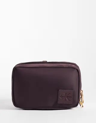 Calvin Klein cosmetic pouch in `burgundy