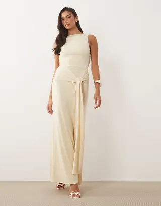 TFNC slinky slash neck open back tie detail maxi dress in cream