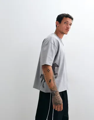 ASOS DESIGN boxy oversized T-shirt with cowboy graphic in gray