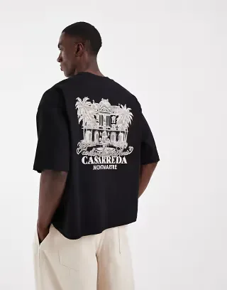 ASOS DESIGN boxy oversized T-shirt with hotel graphic in black