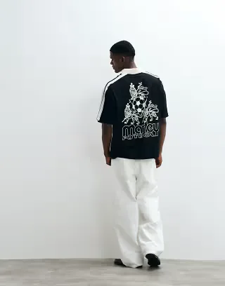 ASOS DESIGN oversized polo with Bob Marley print in Black
