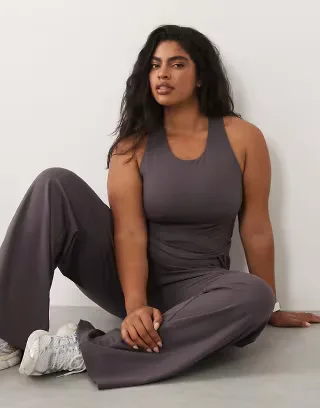4505 Curve Icon soft touch racer back tank top with shelf bra and removable padding in storm gray