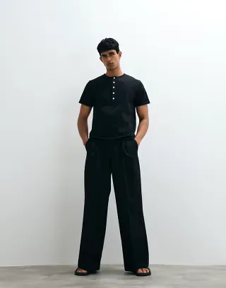 ASOS DESIGN regular fit T-shirt with contrast henley neck in black
