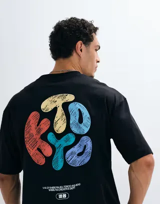 ASOS DESIGN boxy oversized T-shirt with scribbled Kyoto bubble text print in black