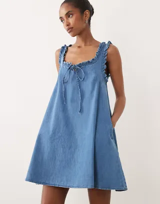 ASOS DESIGN denim frill detail mini dress with pockets in mid blue