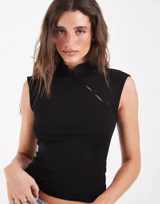 Pieces asymmetric button jersey top in black
