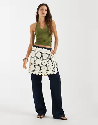 Muse Assembly crochet side tie mini skirt in cream