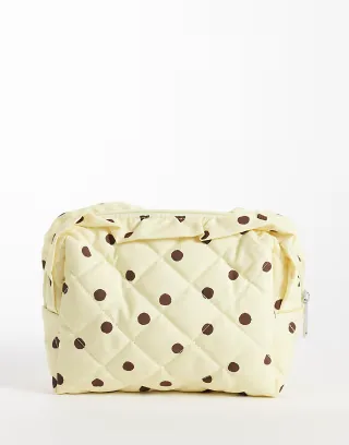 Pieces ruffle trim toiletries bag in yellow and brown polka dot print