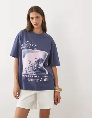 ASOS DESIGN oversized T-shirt with Tofino Surfers graphic in blue and pink