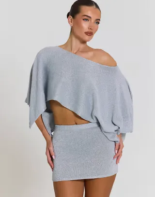 Aria Cove glitter knit off shoulder poncho top and flitter knit mini skirt set in silver