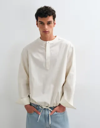 ASOS DESIGN oversized henley shirt with drawcord hem in off white