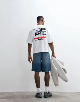 ASOS DESIGN boxy oversized T-shirt with applique Paraiso Studio graphic in white