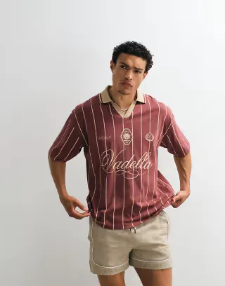 ASOS DESIGN oversized polo shirt with soccer graphics in burgundy stripes