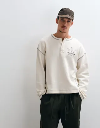 ASOS DESIGN boxy oversized T-shirt with henley and print in cream waffle