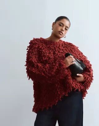 ARRANGE Curve wool blend hand knit ultimate loop fringe sweater in burgundy
