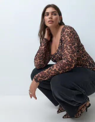 ASOS DESIGN Curve sheer mesh wide round neck long sleeve top in leopard print