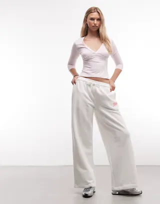 Weekend Collective wide leg sweatpants in off white with print detail