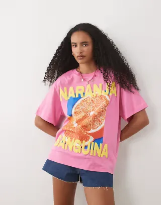 ASOS DESIGN oversized T-shirt with orange graphic in pink