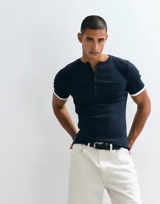 ASOS DESIGN muscle fit t-shirt with henley neck and double layer effect in navy rib knit
