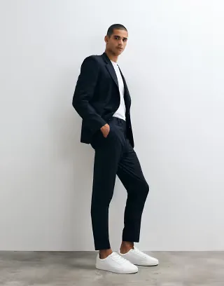 ASOS DESIGN tapered suit pants in navy pinstripes