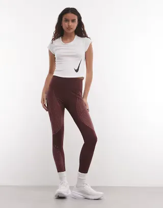 Nike Dri-Fit Swift leggings in burgundy