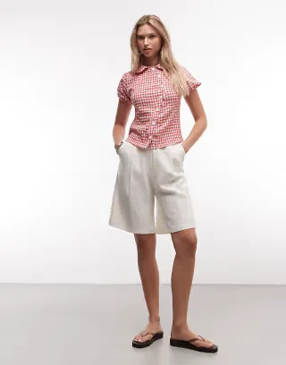Reclaimed Vintage asymmetric placket fitted shirt in red and white plaid