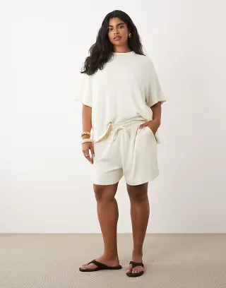 ASOS DESIGN Curve textured knit runner shorts in cream - part of a set