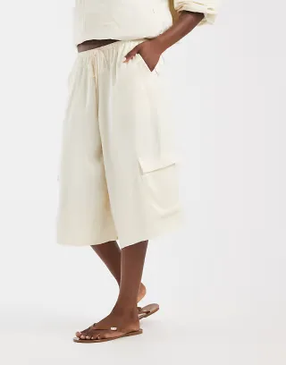 ASOS DESIGN satin bermuda cargo shorts in ecru