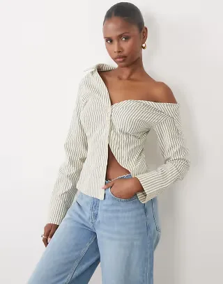 The Frolic exclusive asymmetric off shoulder detail split front flare sleeve shirt in beige striped print