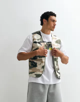 ASOS DESIGN stormMAX™ water resistant utility vest in camo