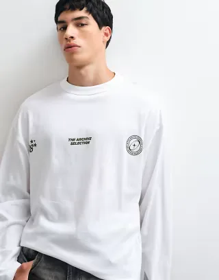 ASOS DESIGN boxy oversized long sleeve t-shirt with sleeve panels and text graphic in white