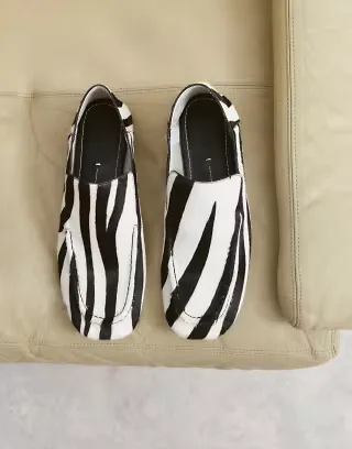 ARRANGE leather loafers in zebra print