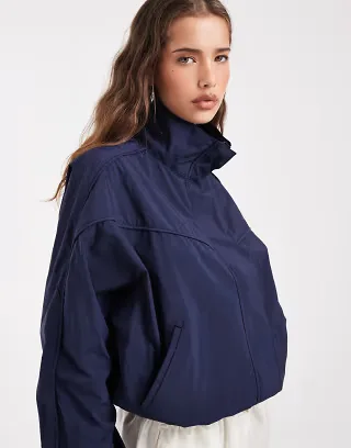 ASOS DESIGN performance fabric funnel neck windbreaker jacket in navy