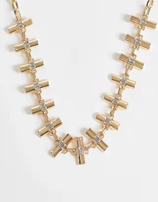 ASOS DESIGN statement necklace with t-bar links and faux crystal detail in gold tone