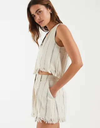 ASOS DESIGN Tailored fringe hem shorts with belt in neutral stripe
