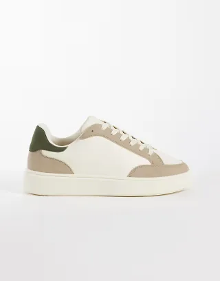ASOS DESIGN lace up sneakers with green heel notch