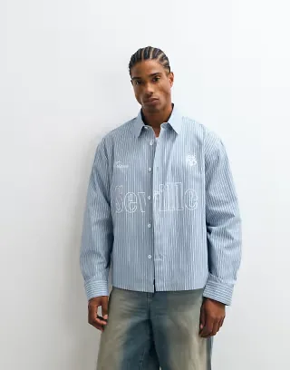 ASOS DESIGN boxy oversized stripe shirt with front print in blue
