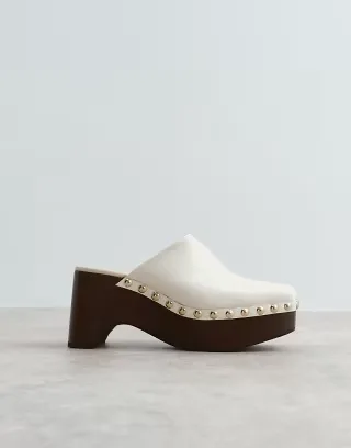 ARRANGE leather studded clogs in bone
