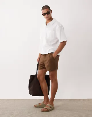 ASOS DESIGN wide textured shorts in short length in brown with elastic waistband