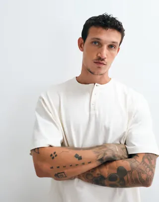 ASOS DESIGN heavyweight relaxed T-shirt with henley neck in cream
