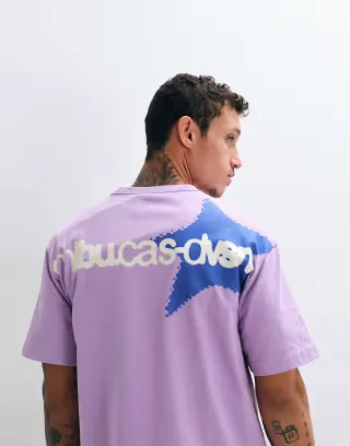 ASOS DESIGN boxy relaxed T-shirt with star graphic in lilac wash