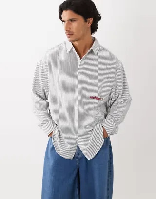 ASOS DESIGN oversized striped shirt with pocket embroidery in black and white