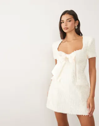ASOS LUXE bouclé structured mini dress with bow detail