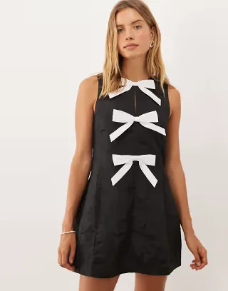 Sister Jane Nova round neck sleeveless bow applique mini dress in black