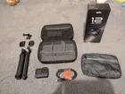 GoPro HERO12 Black 5.3K UHD Action Camera + Grip, Hard case & waterproof bag